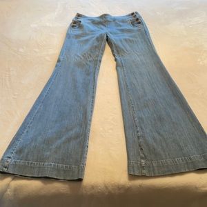 Size 2- mid rise, flare leg, jeans in light blue.